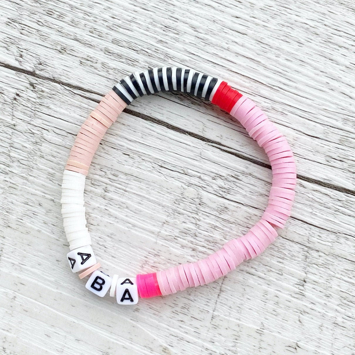 Personalisiertes Armband "Rosa Rot" aus Katsuki Perlen