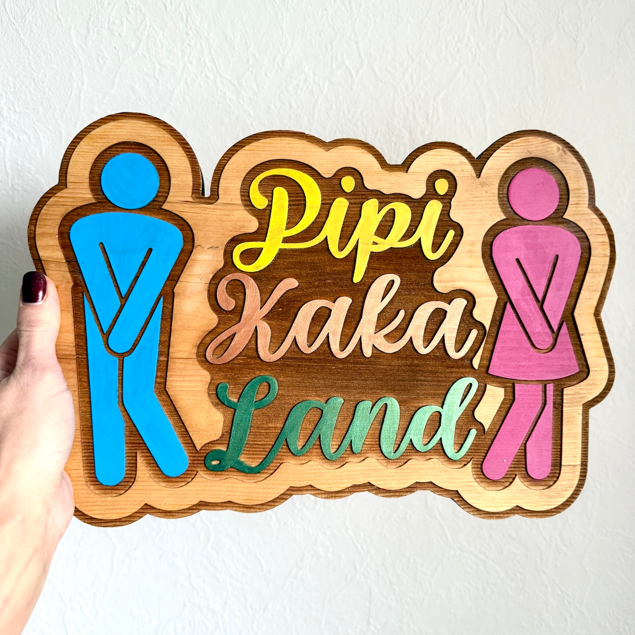Türschild "Pipi-Kaka-Land" aus Holz gelasert und handbemalt