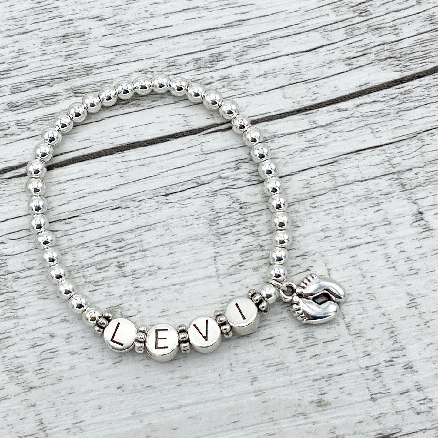 Personalisiertes Armband "Sweet Feet" aus Edelstahl Perlen mit Herz oder Füßen