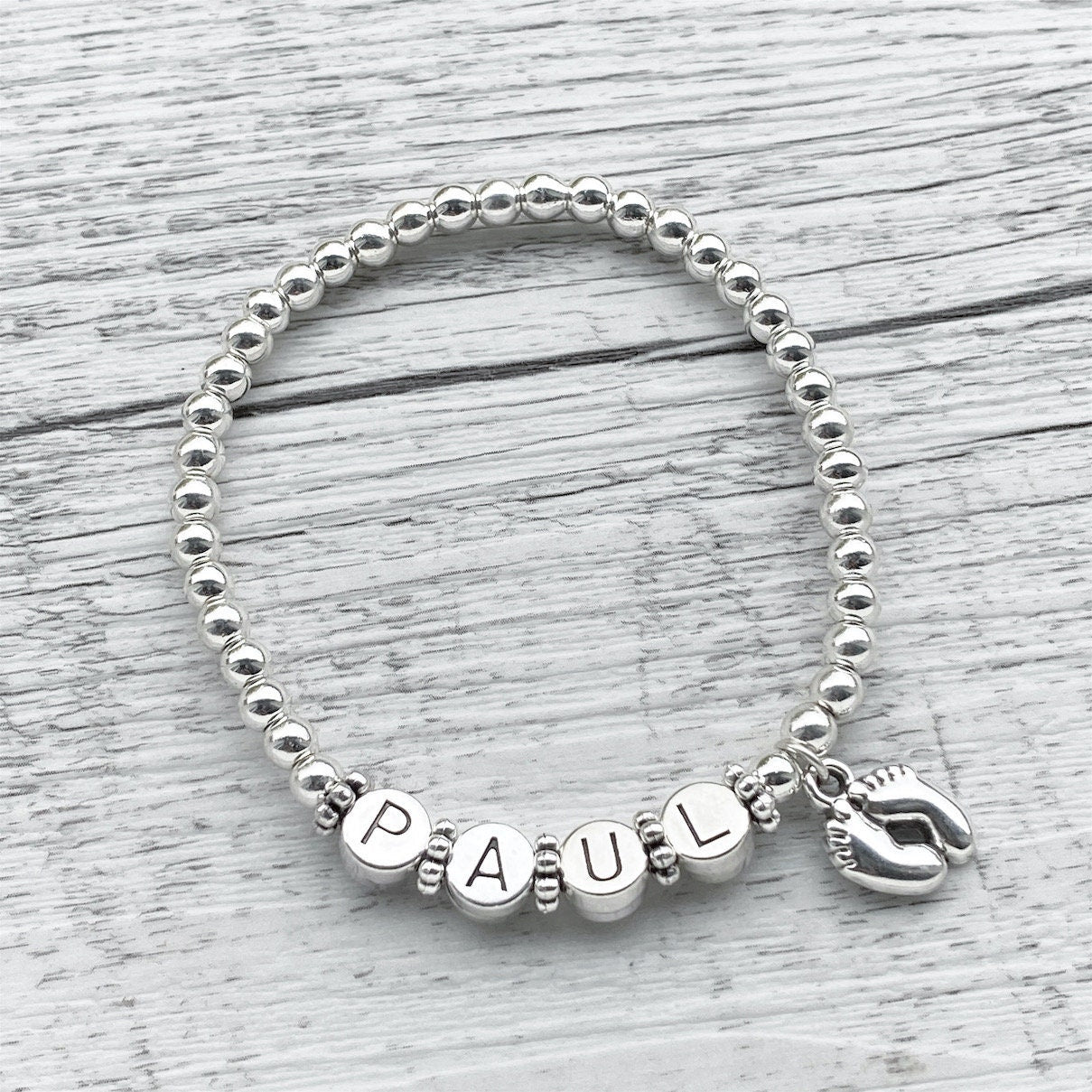Personalisiertes Armband "Sweet Feet" aus Edelstahl Perlen mit Herz oder Füßen