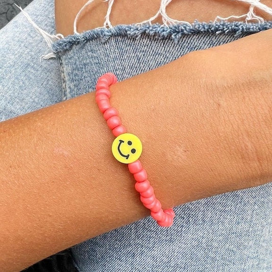 Smiley Armband Korall aus Rocailles Glasperlen